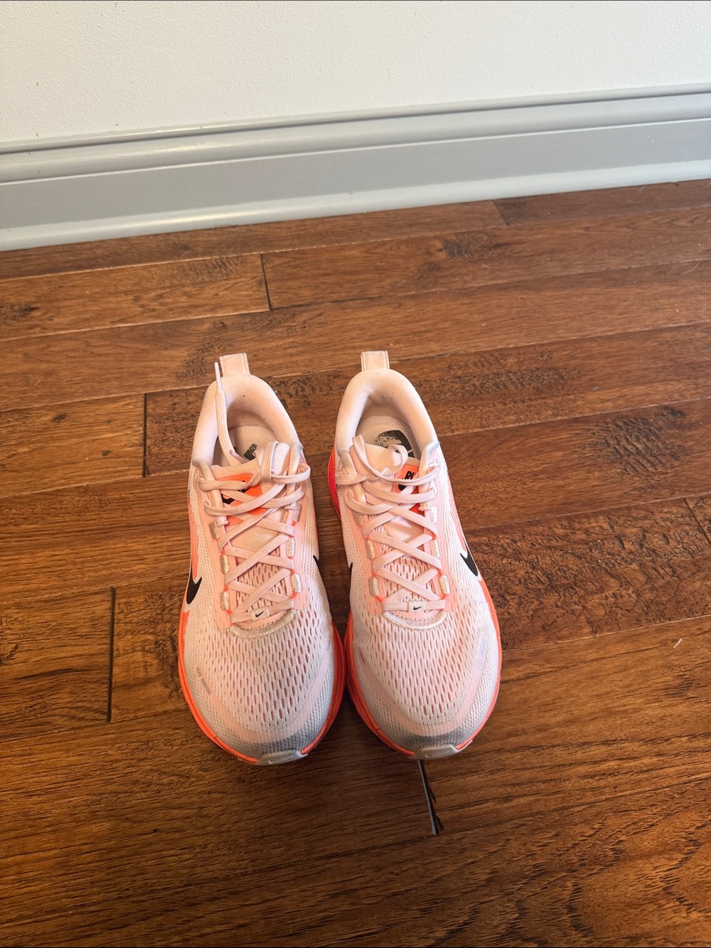 Nike Women’s Athletic Running Shoes in Pink and Orange with Black Swoosh